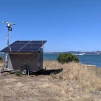 M2 monitoring station on grassy bluff overlooking SF Bay