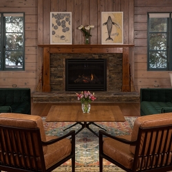 Hearth Lounge with fire place, two couches, two chairs