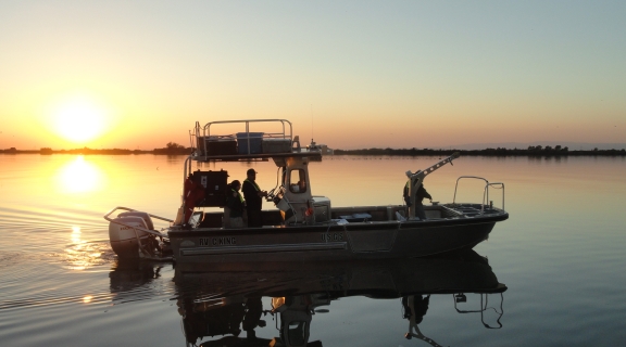 boat on the water at sunset